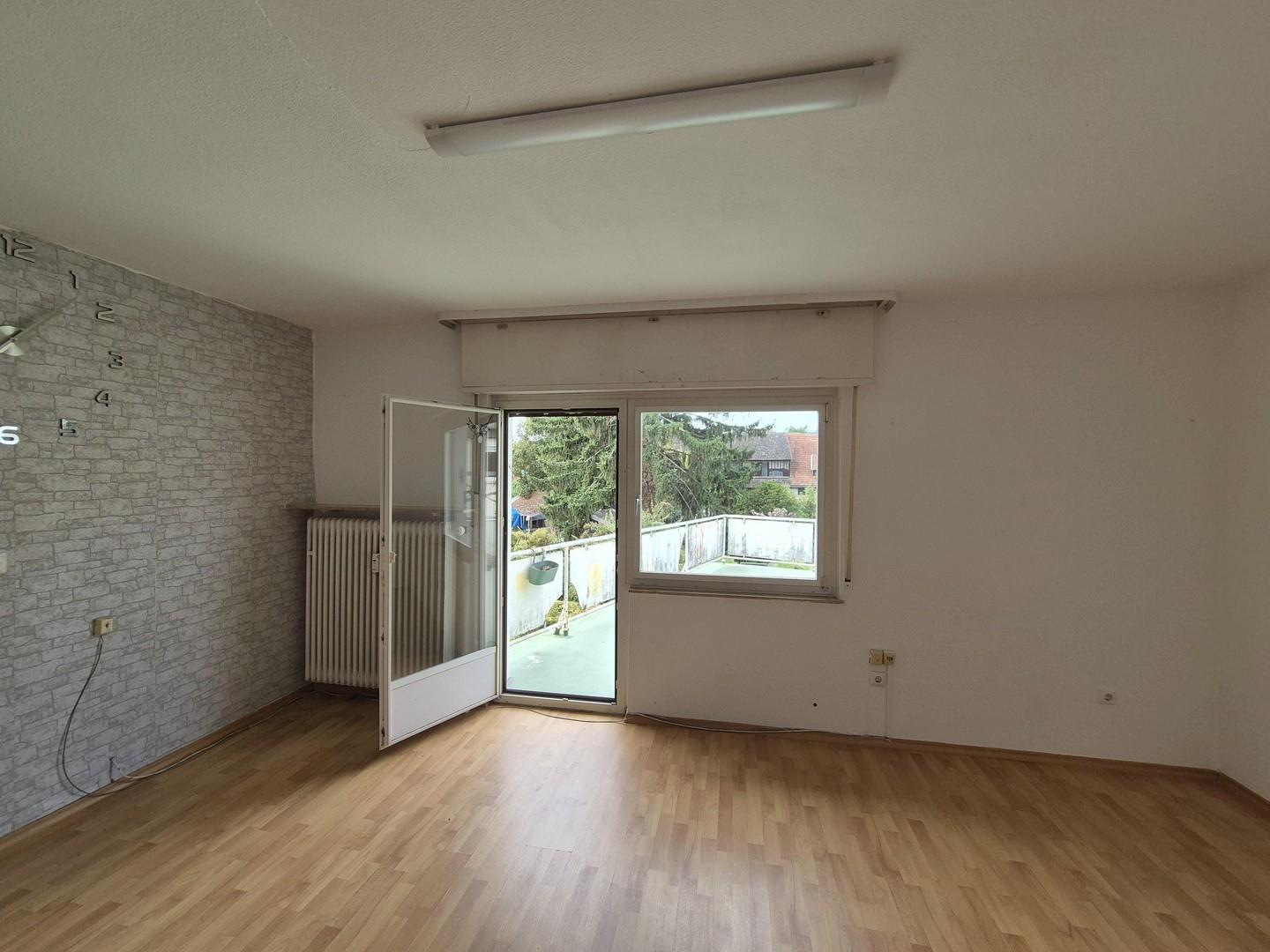 Wohnzimmer mit Balkon