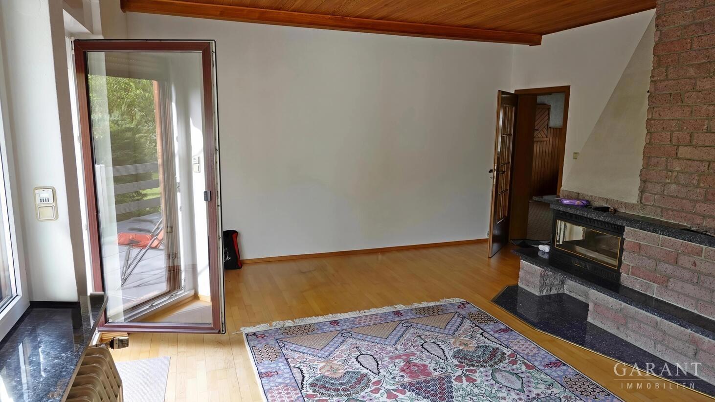 Wohnzimmer mit Kamin