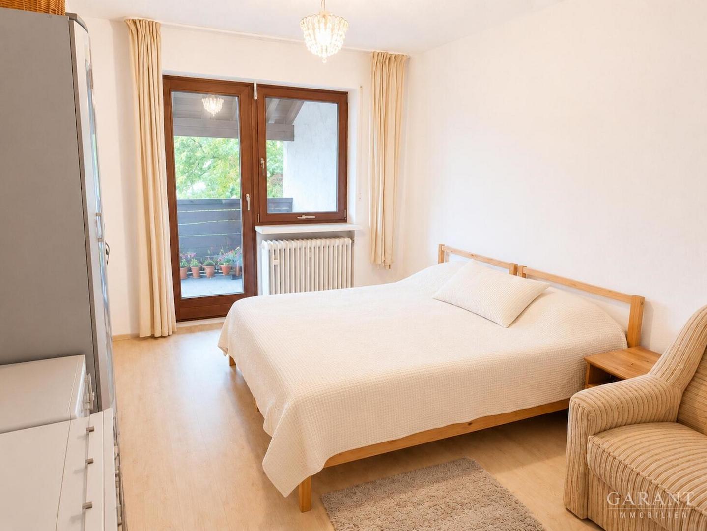 Schlafzimmer mit Balkon