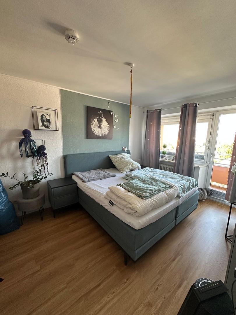 Schlafzimmer mit Balkon