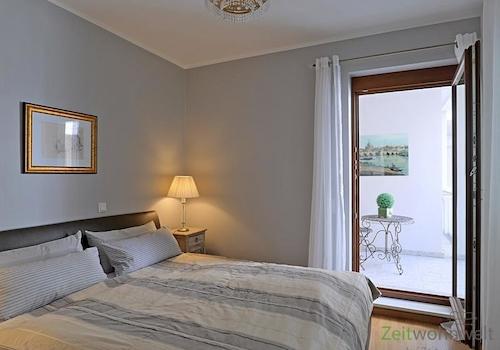 Schlafzimmer mit Balkon