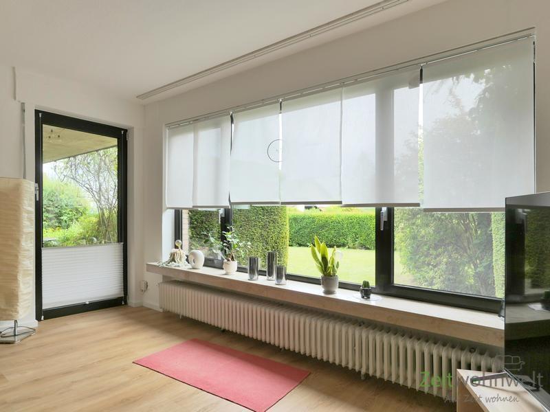 seitlicher Terrassenausgang und Panoramafenster