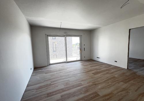 Wohnzimmer mit Balkon
