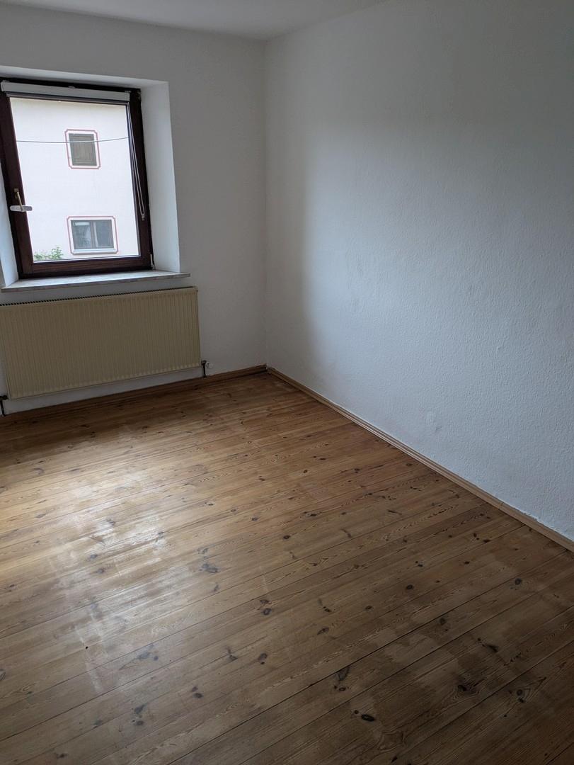 Zimmer mit Holzboden