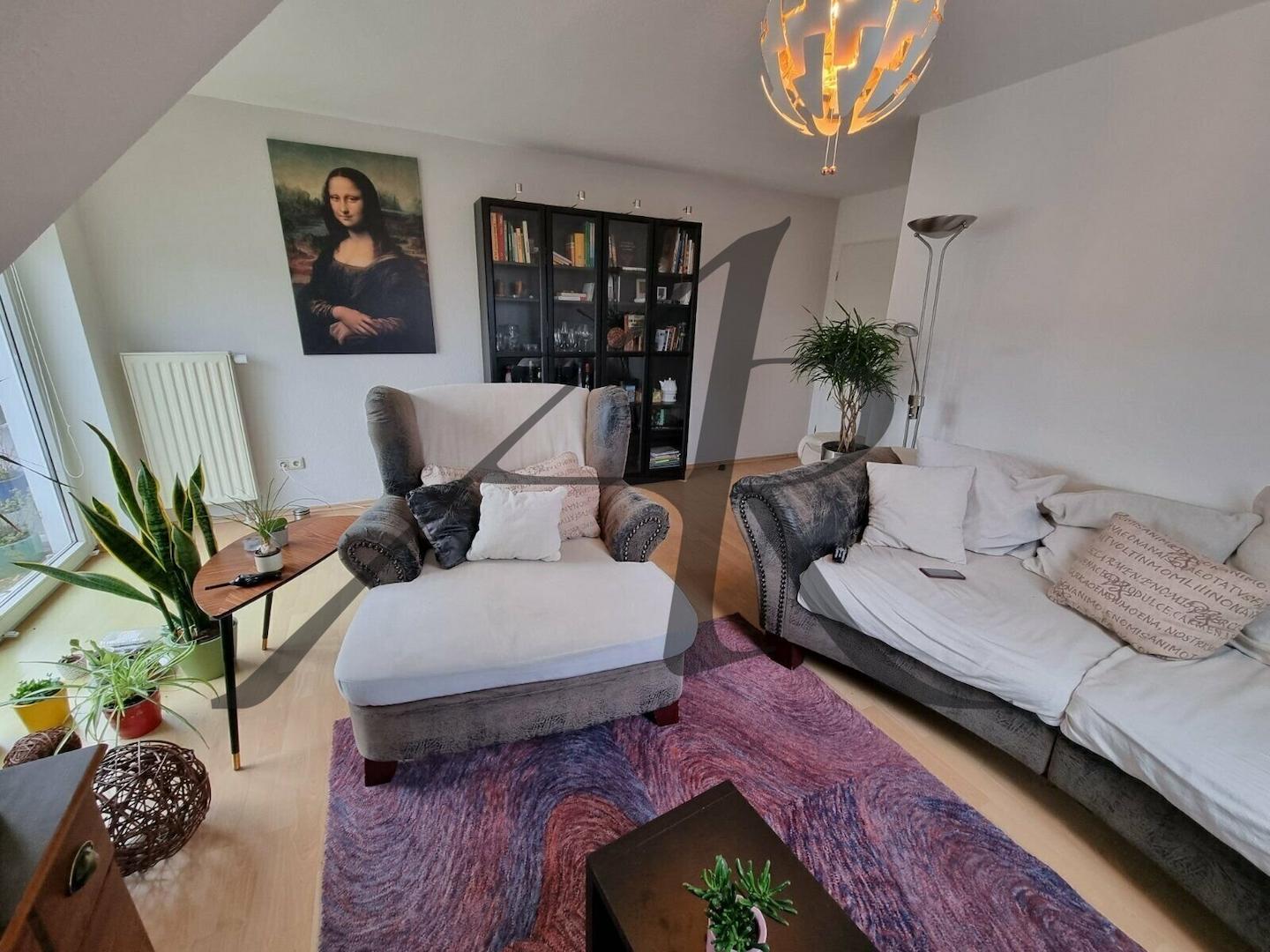 Wohnzimmer mit Balkon