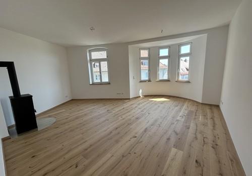 Wohn-/Esszimmer mit Ofen