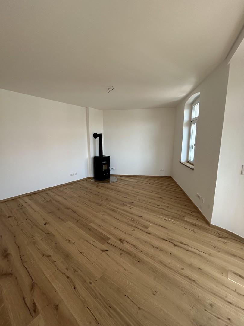 Wohn-/Esszimmer mit Ofen