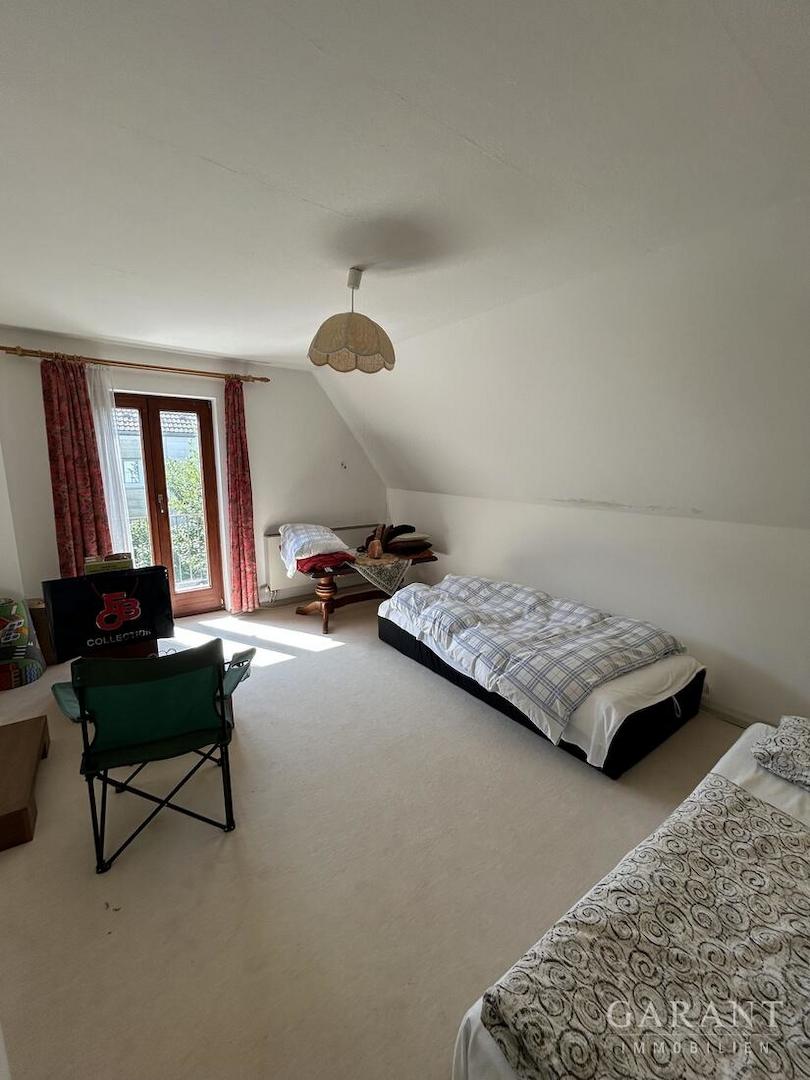 Schlafzimmer mit Balkonzugang