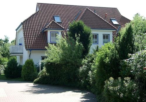 Haus mit Wohnung links unten