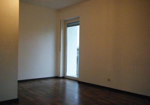 Schlafzimmer mit Balkontür