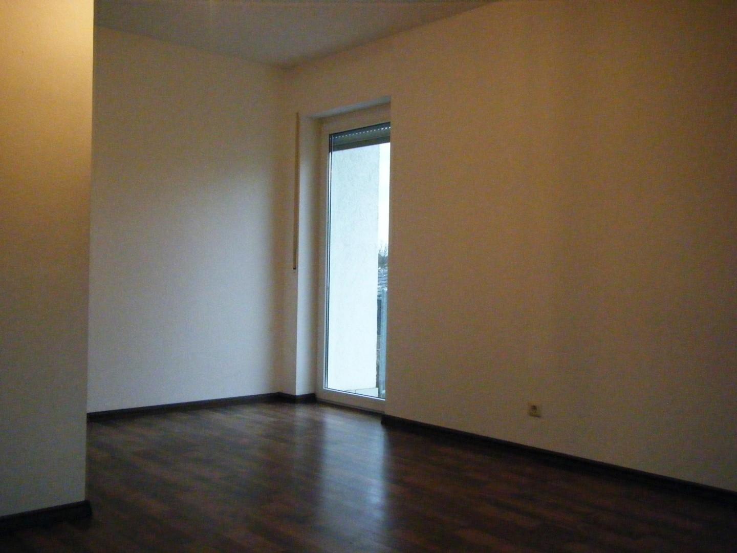 Schlafzimmer mit Balkontür
