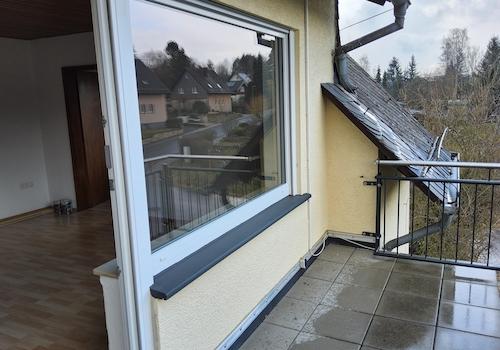 Balkon mit Wohnzimmer
