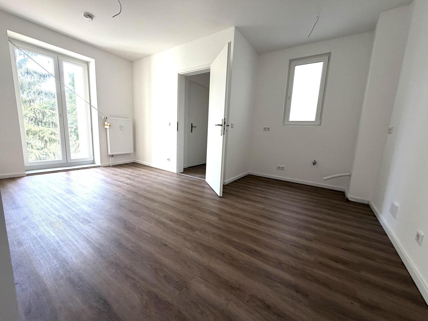 Wohn- und Esszimmer, Küche