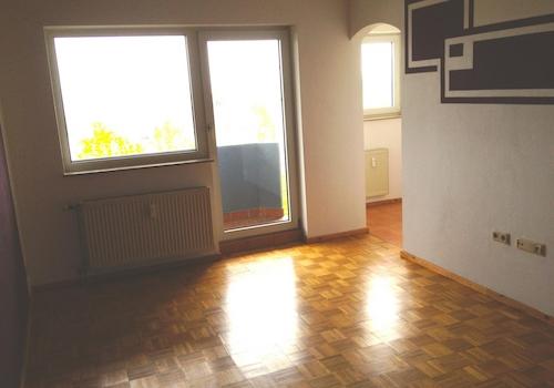 Wohnzimmer mit Balkon
