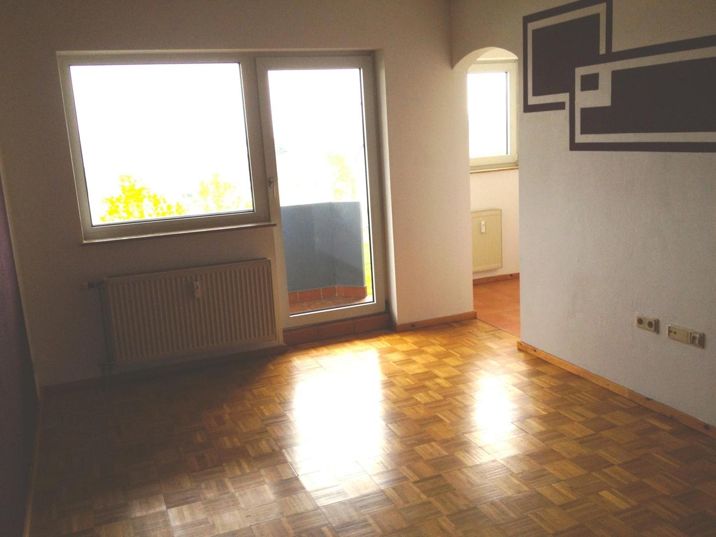 Wohnzimmer mit Balkon