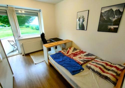 Schlafzimmer mit Balkon
