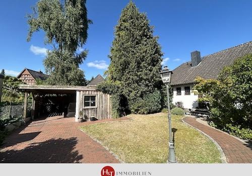 H&T Immobilien - Bungalow in Weyhe