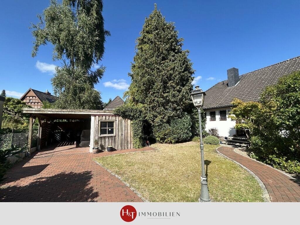 H&T Immobilien - Bungalow in Weyhe
