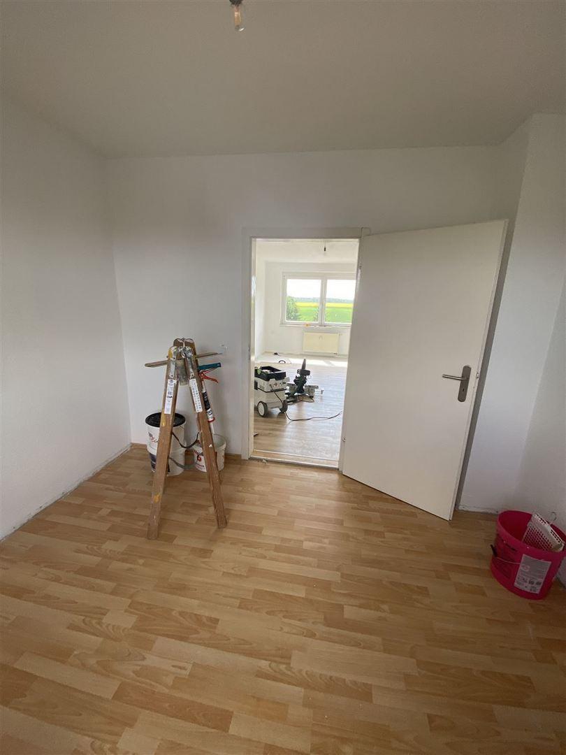 Schlafzimmer mit Blick zum WZ
