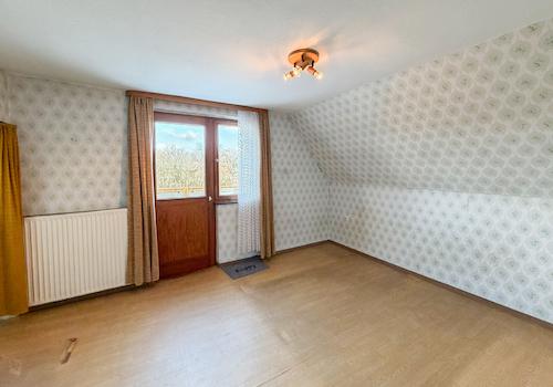 Schlafzimmer mit Zugang zur Dachterrasse