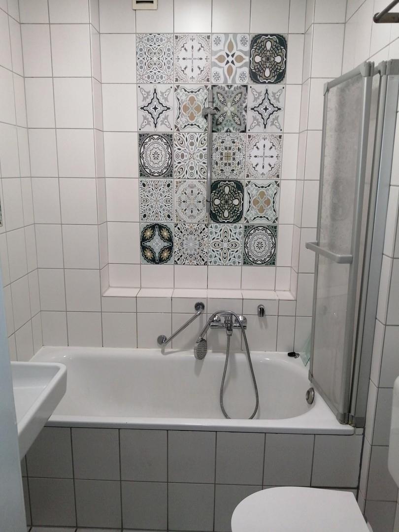 Bad mit Verzierung