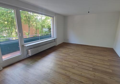 Wohnzimmer mit Balkon