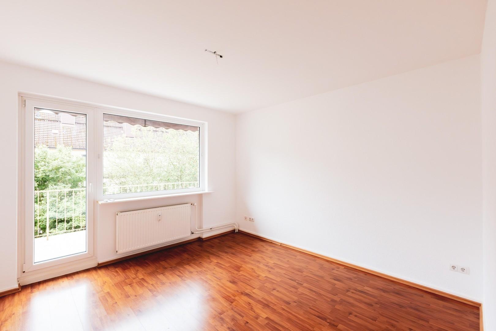 Zimmer mit Balkonzugang