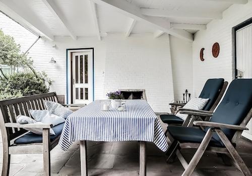 Veranda mit offenem Kamin