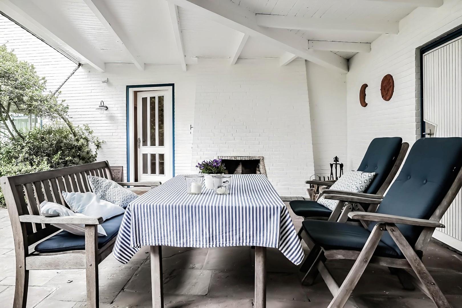 Veranda mit offenem Kamin