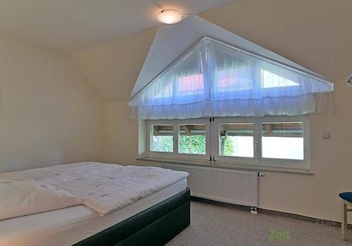 Fensterfront im Schlafzimmer