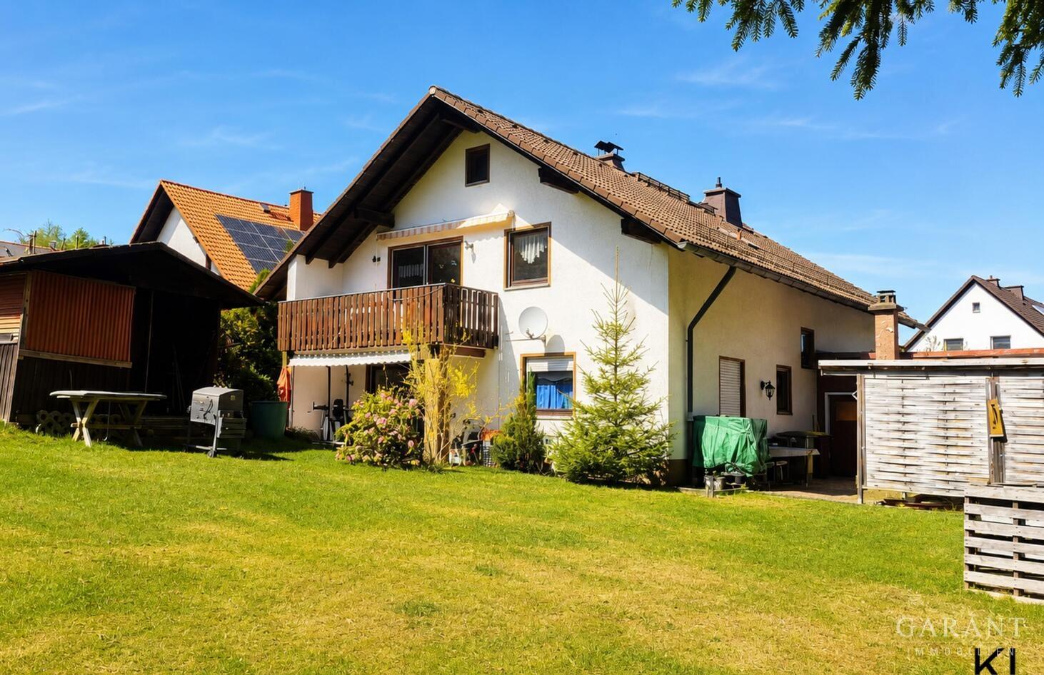 Haus mit Garten Rückseite