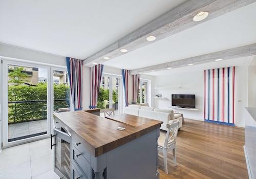 Wohnzimmer mit Küche