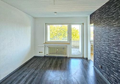 Wohnzimmer mit Balkon