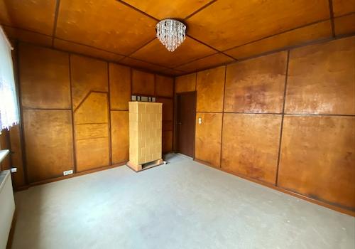 Wohnzimmer mit Kachelofen