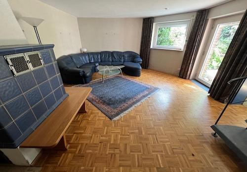 Wohnzimmer mit Kachelofen