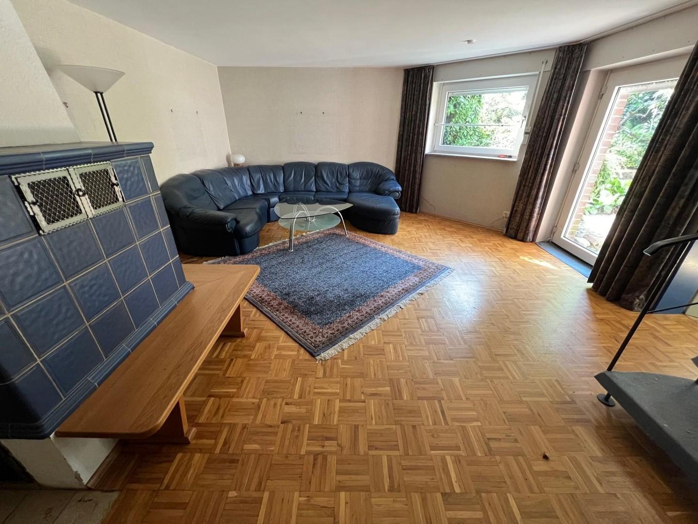 Wohnzimmer mit Kachelofen