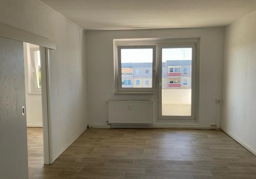 Wohnzimmer mit Balkon