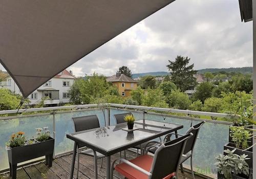 Dachbalkon mit Sonnensegel