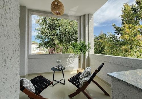 Balkon und Grünblick