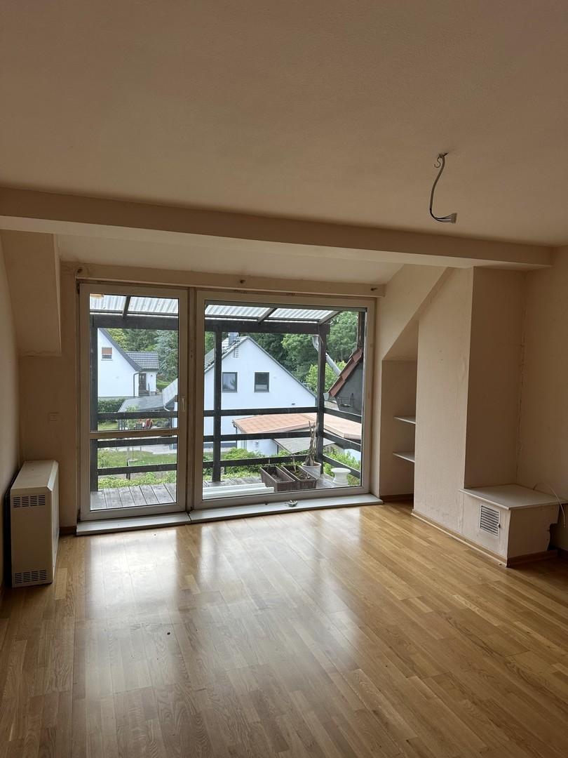 Balkonzimmer mit Parkettboden