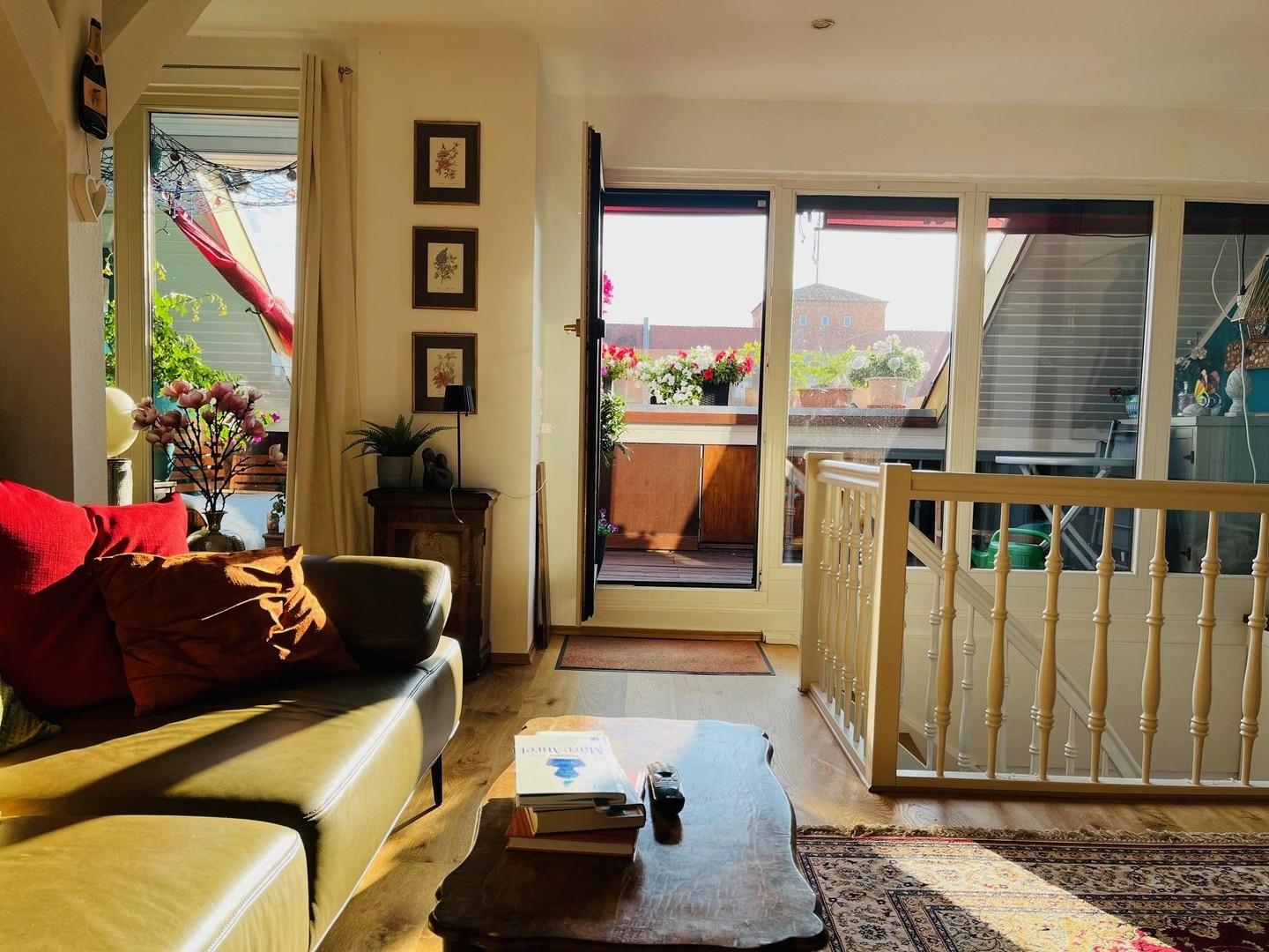 Wohnzimmer mit Zugang zur Süd-