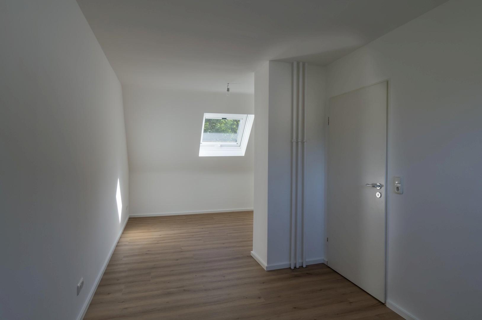 Schlafzimmer mit Dachschräge