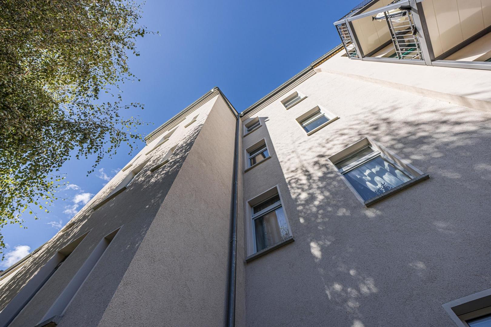 Wohn- und Geschäftshaus | Fassade - Gartenseite
