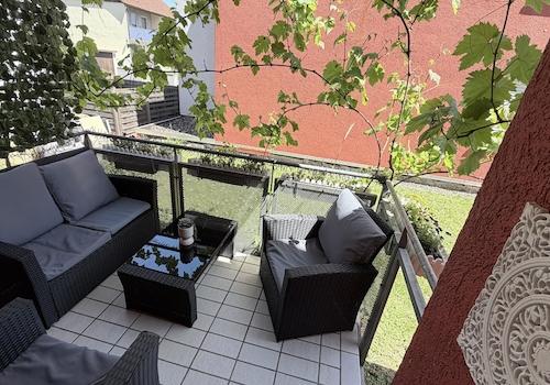Überdachter Balkon