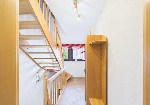 Treppenaufgang in die ausgebaute Dachspitze
