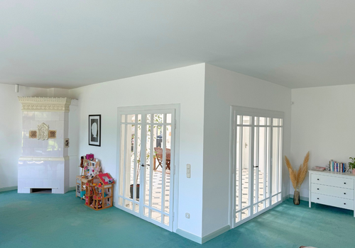 Wohnzimmer und Kachelofen