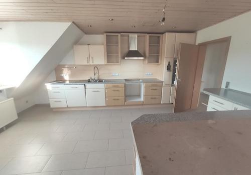Whg. 1: Offene Küche mit Essbereich und Wohnzimmer Bild 3