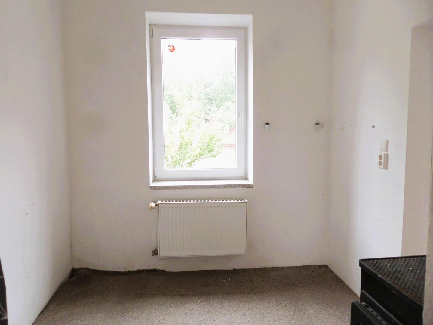 Arbeitszimmer mit Kaminofen