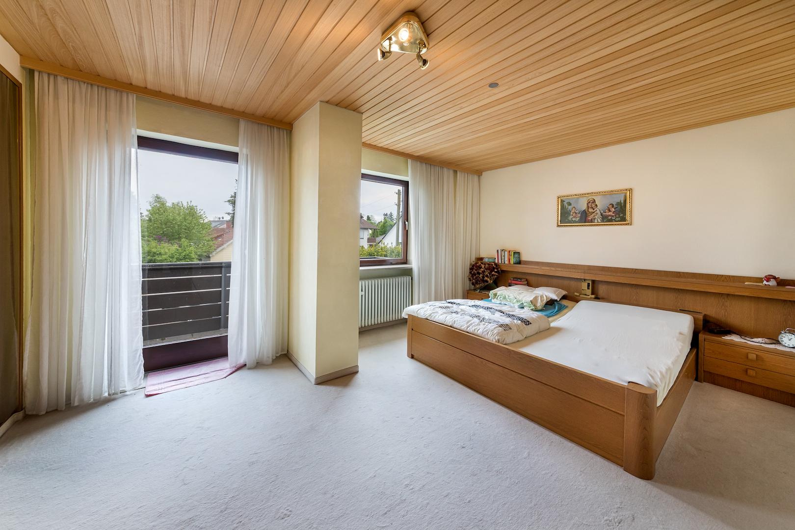 Schlafzimmer mit Balkon