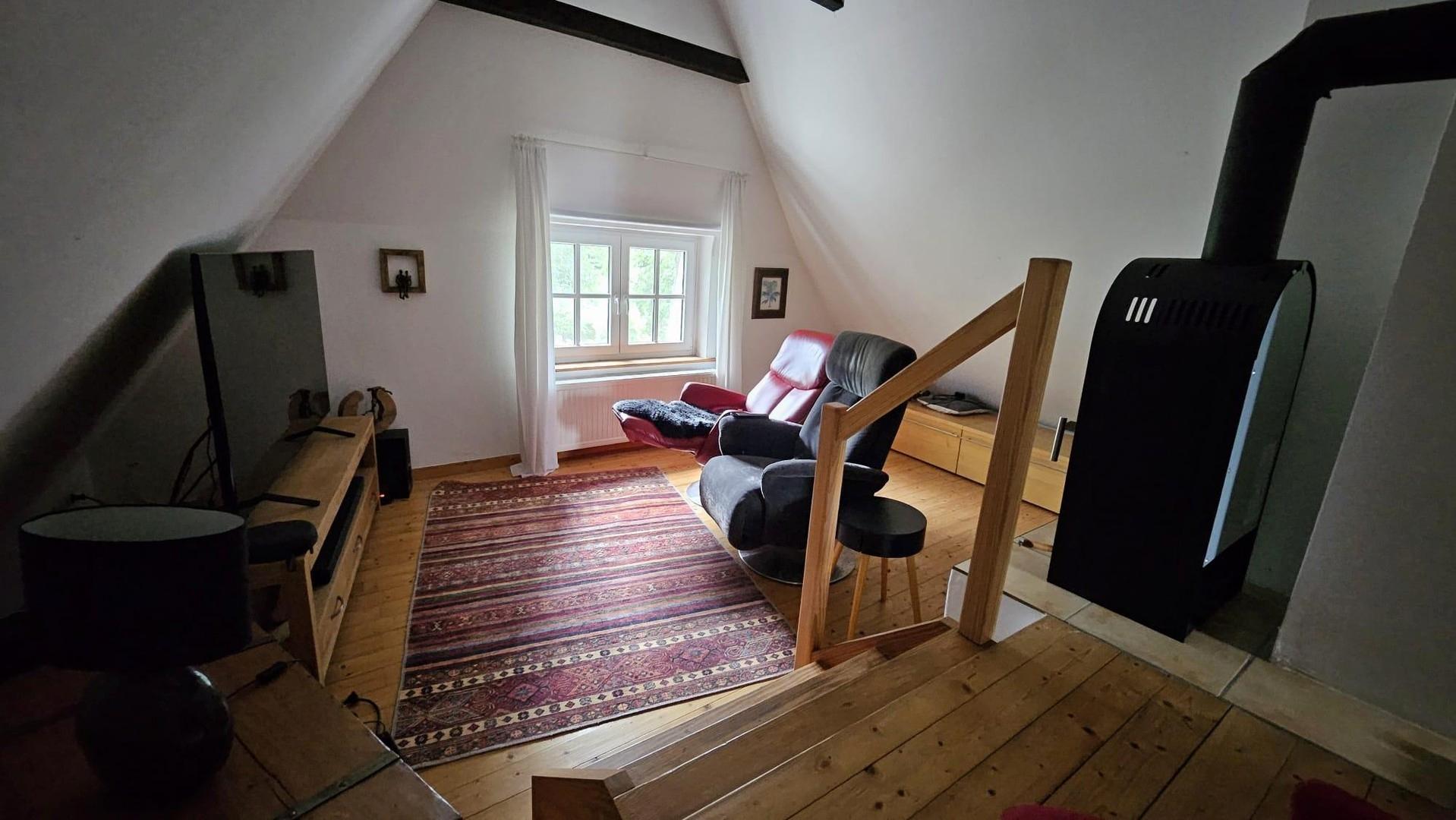Studio mit Kaminofen OG